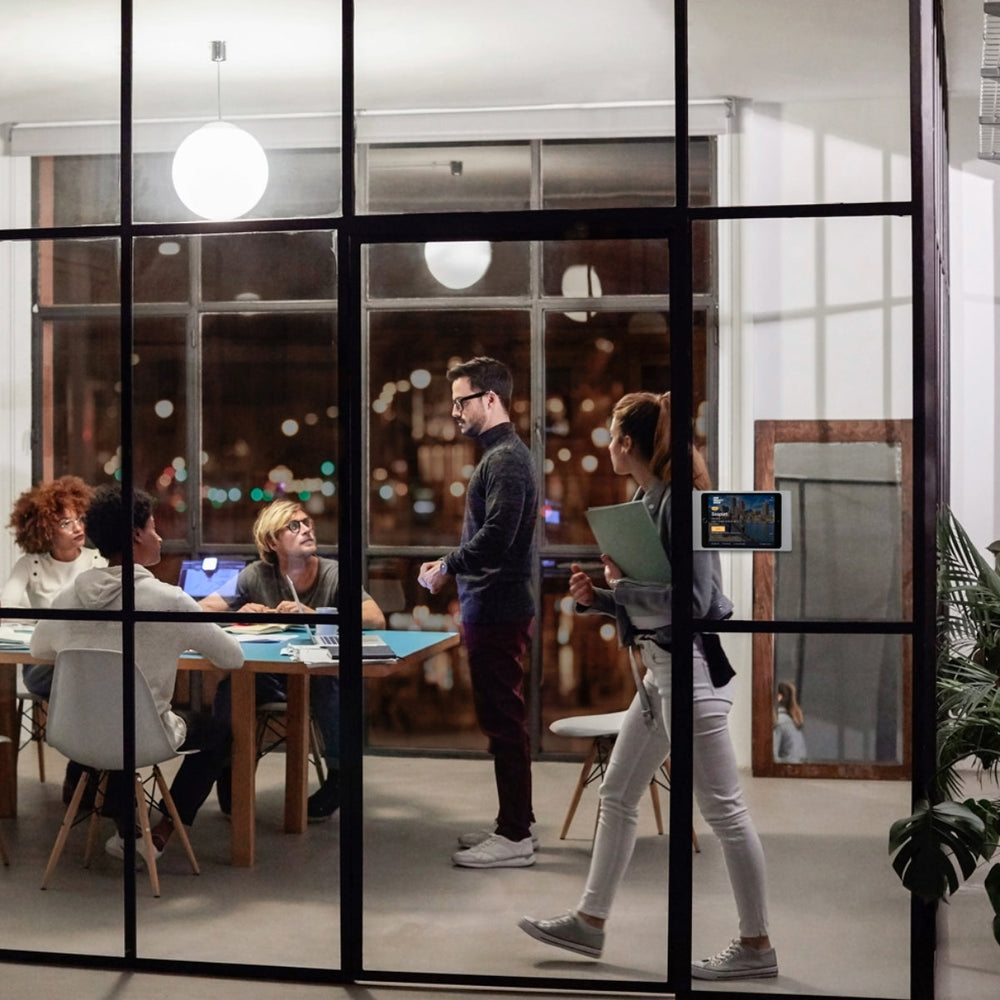 a group of people in a conference room